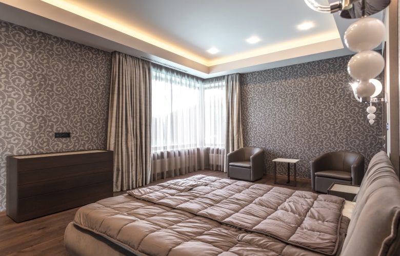 Cove lighting in the ceiling of the bedroom - Beautiful Homes