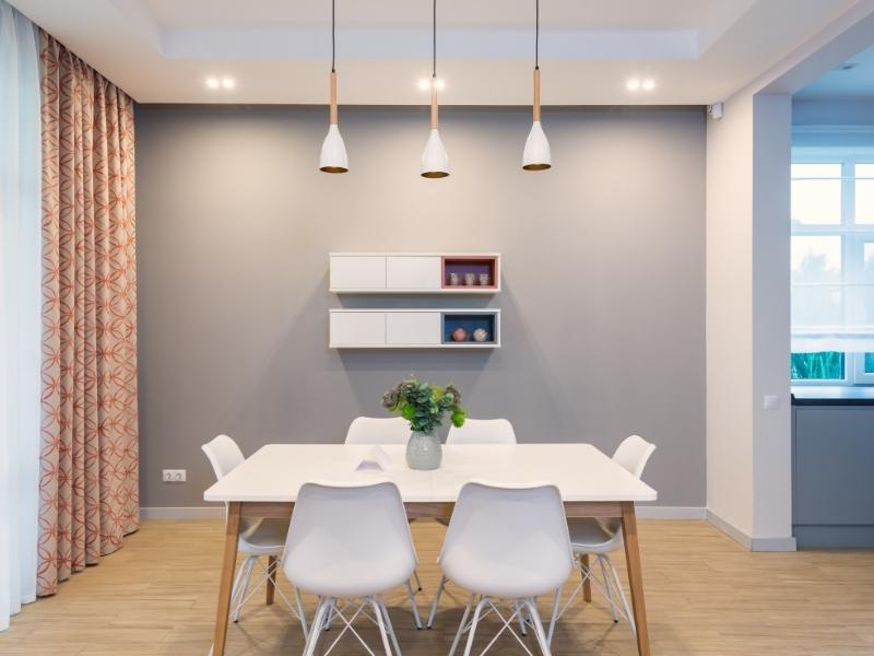 Dining wall area décor with hanging lights - Beautiful Homes