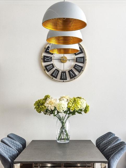 Dining wall décor ideas with clocks - Beautiful Homes