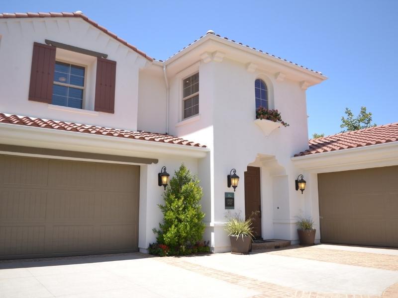 White cream & brown shades of house outside colour combination - Beautiful Homes