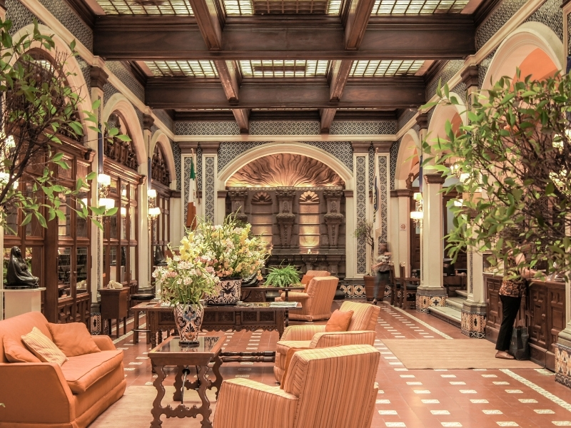 Brown shade of athangudi tiles for the living room flooring - Beautiful Homes