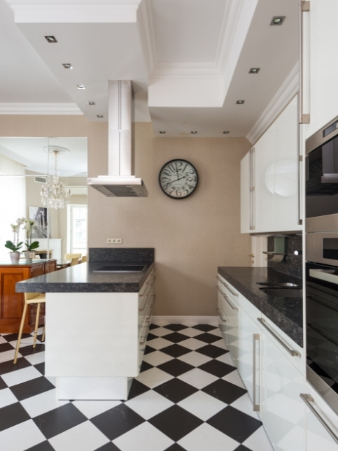 Checkered pattern athangudi tiles for kitchen flooring - Beautiful Homes