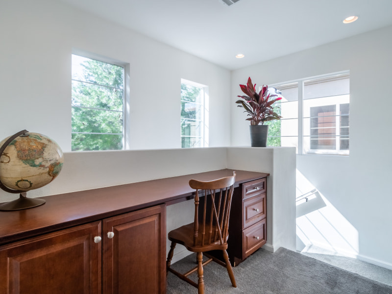 White colours for home office with wooden study table - Beautiful Homes
