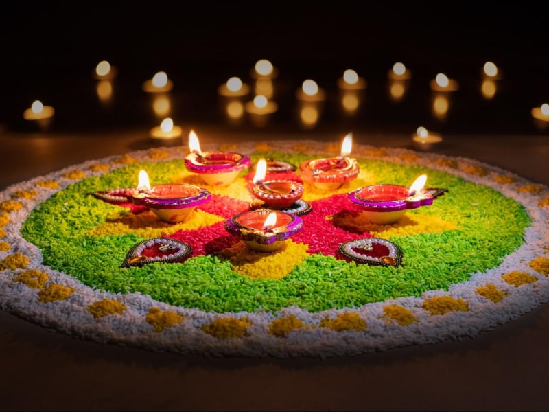 Diwali diya decoration with rangoli - Beautiful Homes