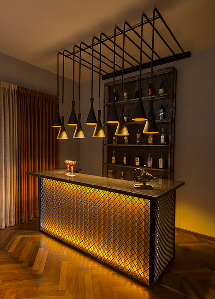Home bar countertop with lighting & wood flooring - Beautiful Homes