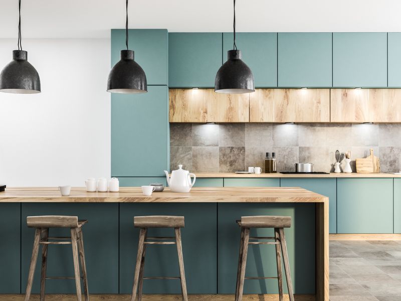 Sea green kitchen cabinets for a modern green modular kitchen with island - Beautiful Homes