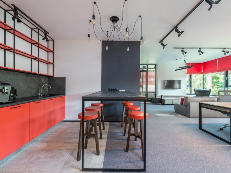 Red triadic colours for an open living room layout - Beautiful Homes