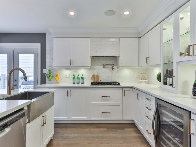 North facing kitchen vastu with white cabinets - Beautiful Homes