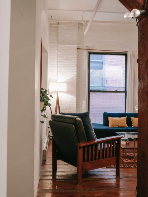 Wooden flooring with white wall brick design for your interiors - Beautiful Homes