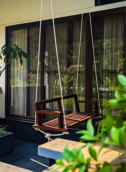 Wooden swing for balcony décor - Beautiful Homes Wooden swing for balcony décor - Beautiful Homes