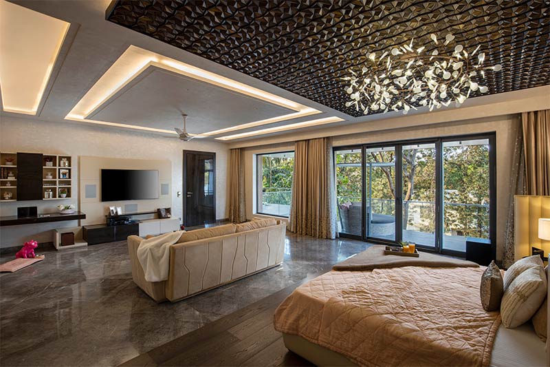 3D PVC ceiling design with a luxurious chandelier in the living room - Beautiful Homes