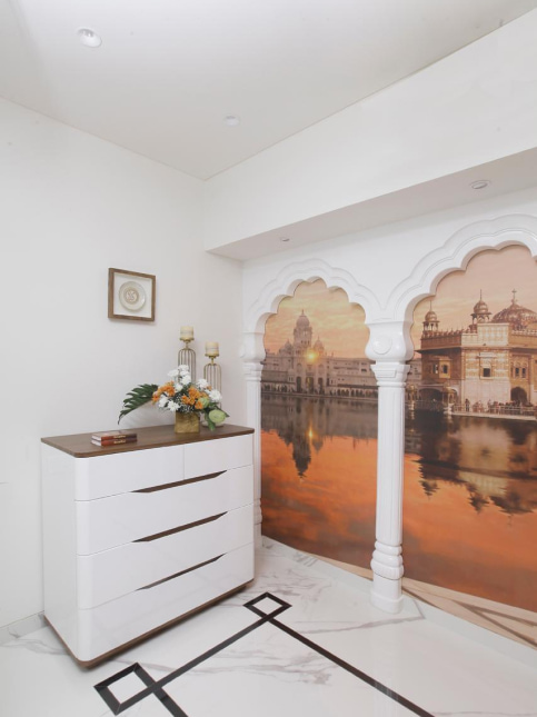 Puja room with cabinet storage in the corner - Beautiful Homes
