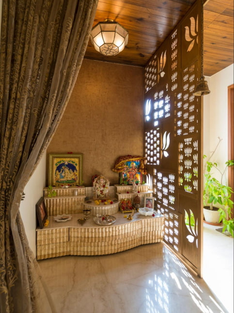 Space saving small pooja room design in apartment hallway - Beautiful Homes