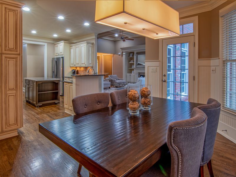 Wood wall interior design with dining table - Beautiful Homes