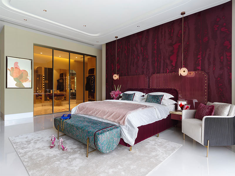 Dark magenta bedroom walls with matching headboard - Beautiful Homes