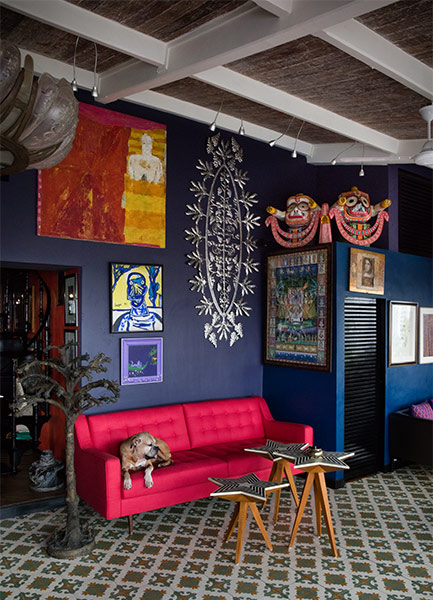 Vibrant magenta colour sofa for a boho living room - Beautiful Homes