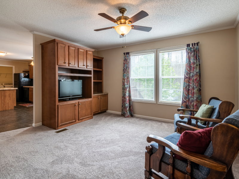 A TV console with storage unit in the living room - Beautiful Homes