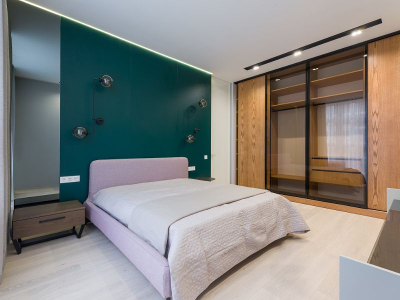 Modern glass sliding wardrobe design for the bedroom - Beautiful Homes