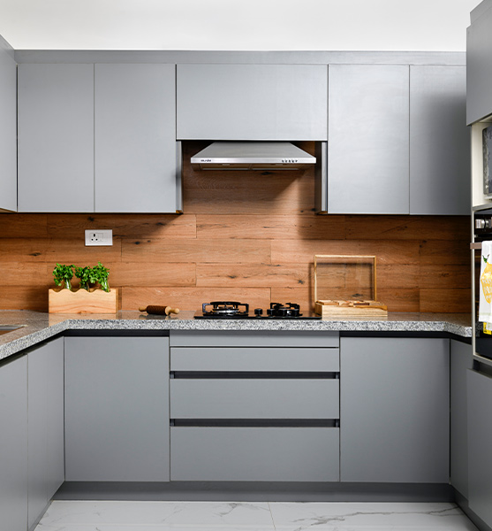 Grey parallel kitchen design with wooden backsplash - Beautiful Homes