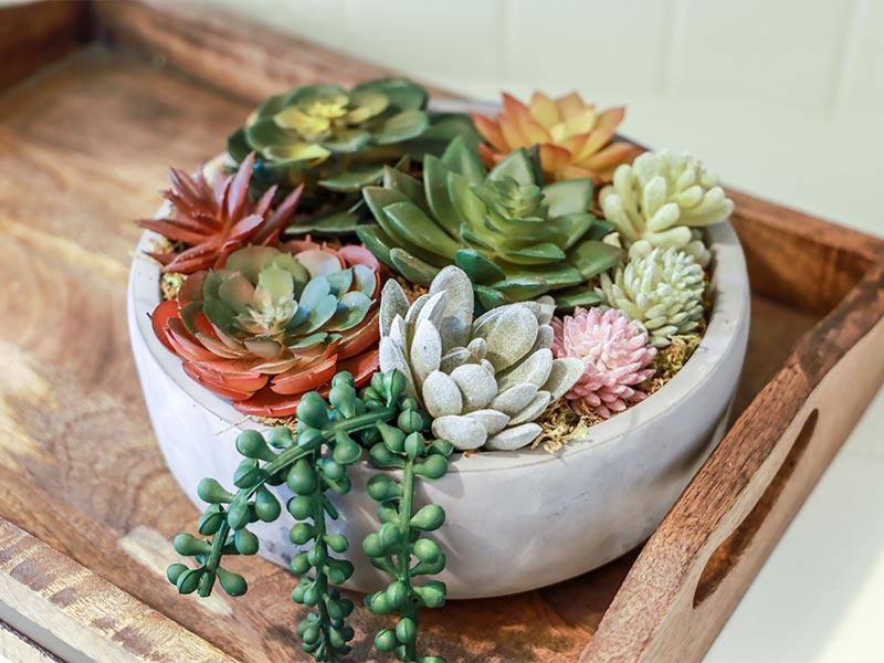 Artificial flower arrangement in bowl – Beautiful Homes