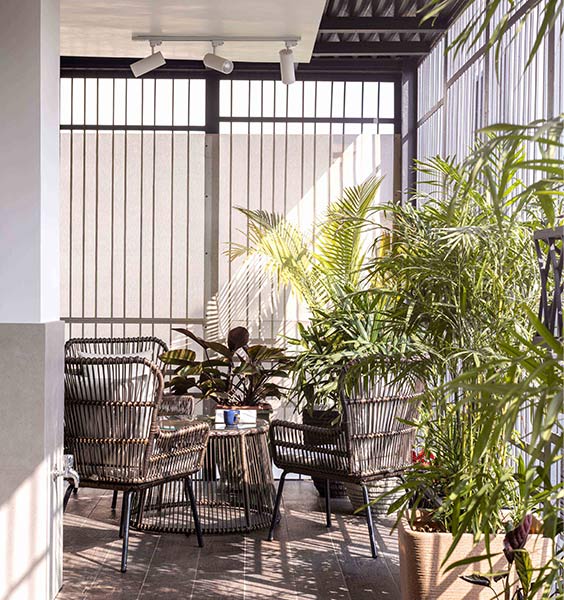 Small balcony furniture with cane chairs & center table - Beautiful Homes