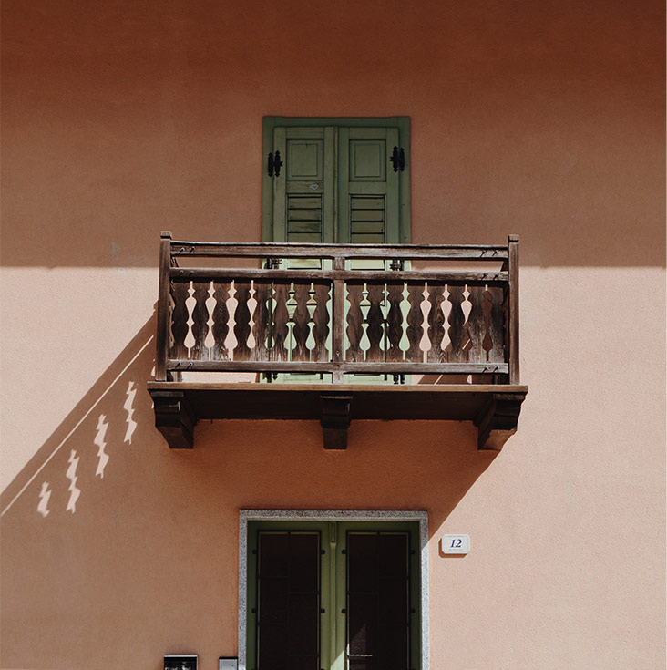 Earthy wooden safety balcony grill design - Beautiful Homes