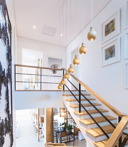 Modern High Ceiling Living Room Staircase with Natural Light - Beautiful Homes