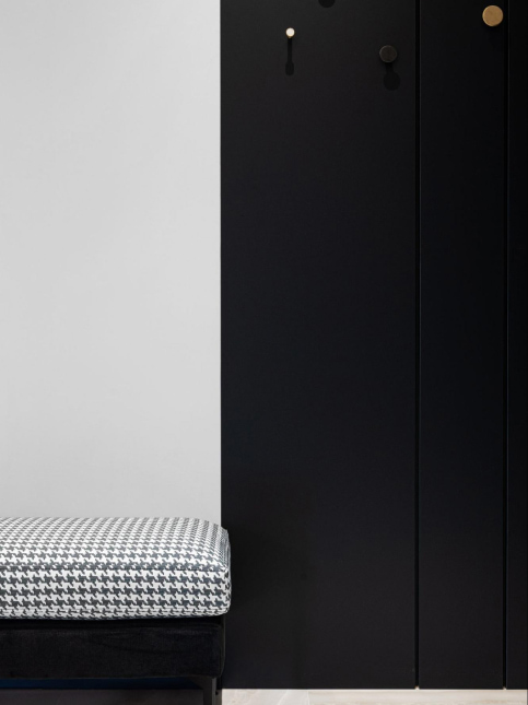 Black wardrobe design with golden handles - Beautiful Homes