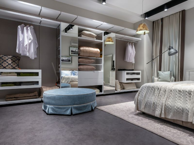 Glass & dark wood wardrobe design - Beautiful Homes