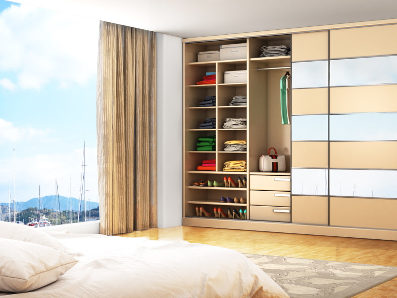 Open wardrobe with half closed door for your home - Beautiful Homes