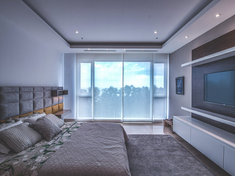 Sliding UPVC door design in the bedroom - Beautiful Homes