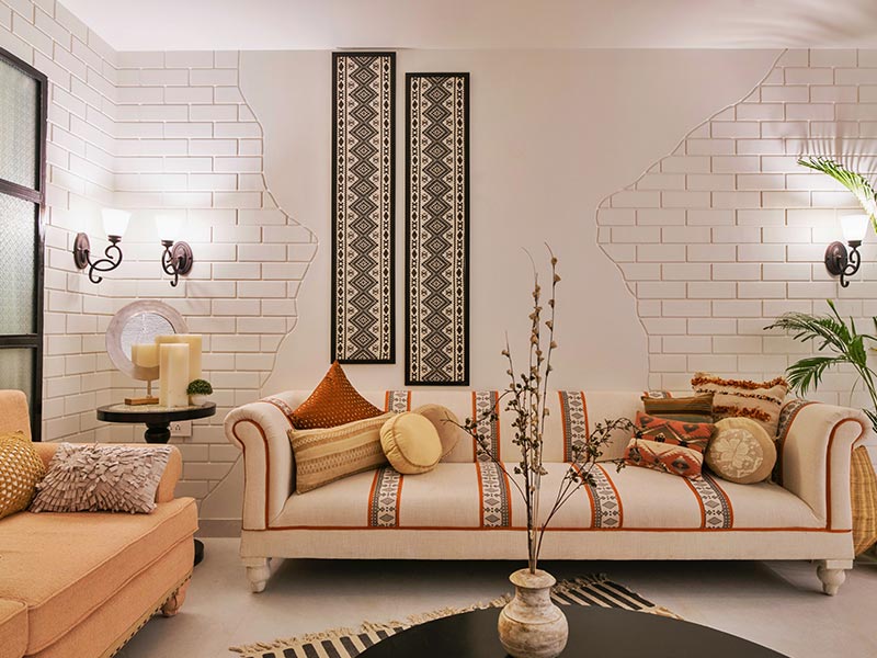 All white concrete wall finish in a living room accent wall - Beautiful Homes