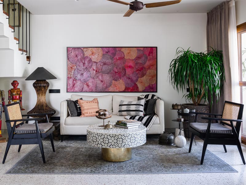 Living room design with abstract art -  Beautiful Homes