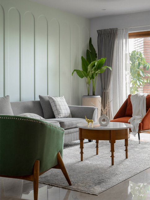 Green wall panels for living room with area rug – Beautiful Homes