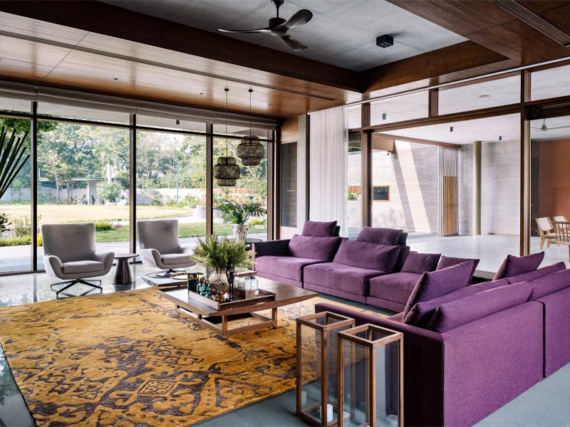 Glass Wall Design in the Living Space with a Courtyard View – Beautiful Homes