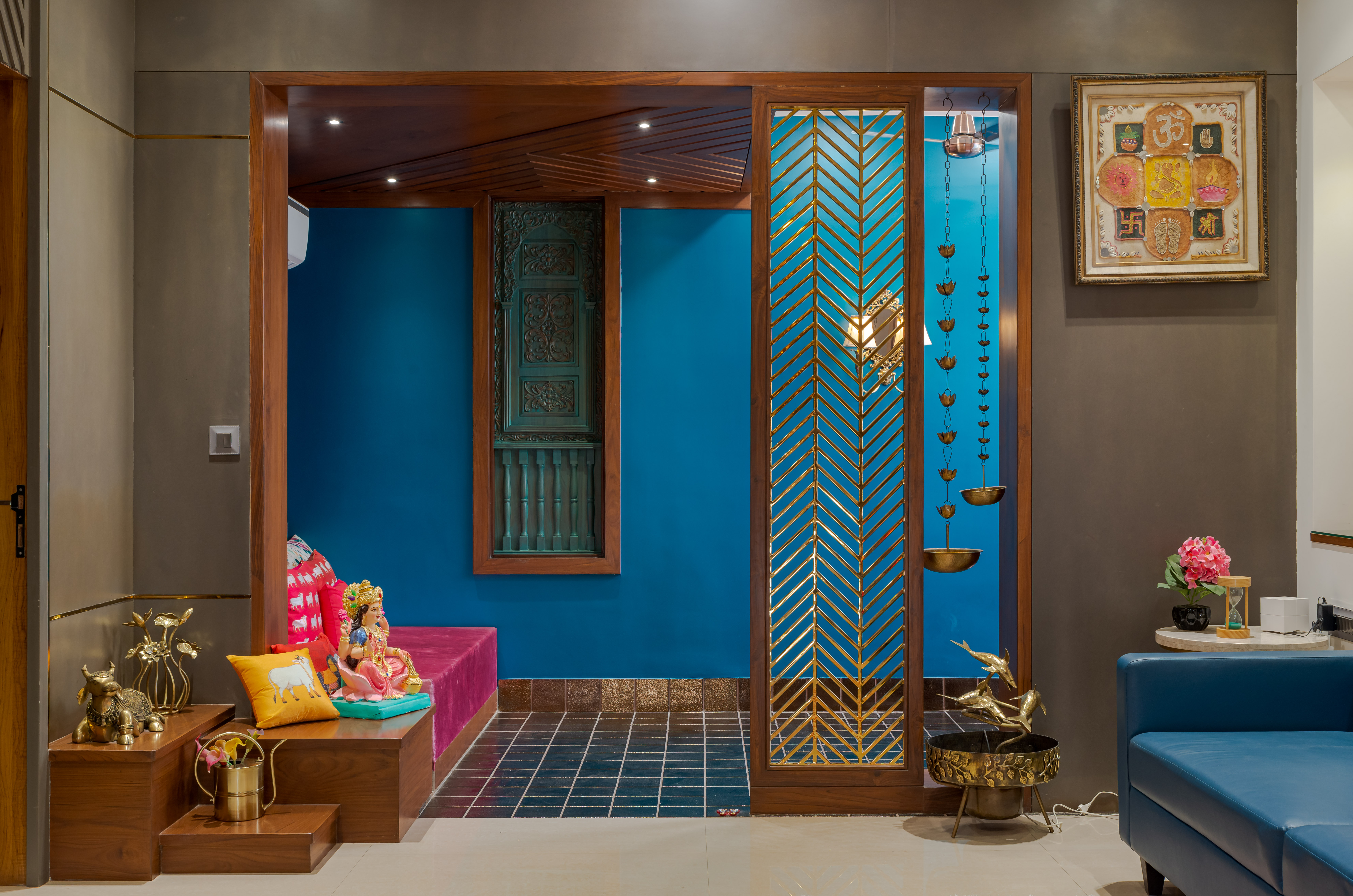 Brown Pooja Room with Blue Accent Wall - Beautiful Homes