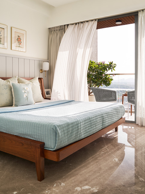 Airy Master Bedroom with Peaceful Seating in Balcony - Beautiful Homes