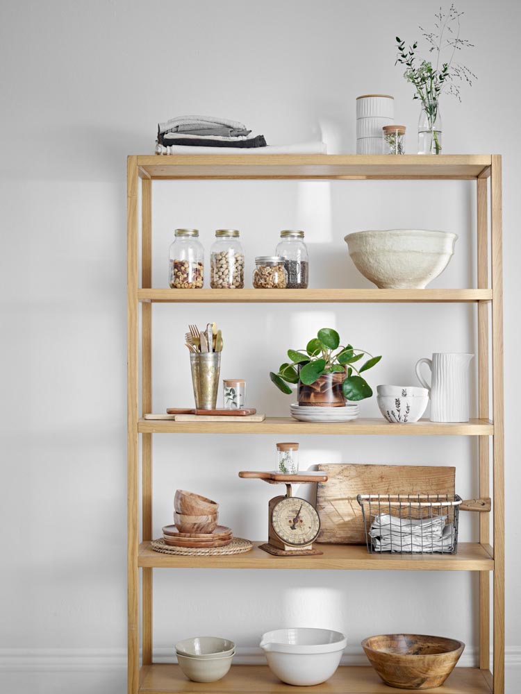 Modern kitchen design with a functional wooden rack with houseplants for décor & storage - Beautiful Homes