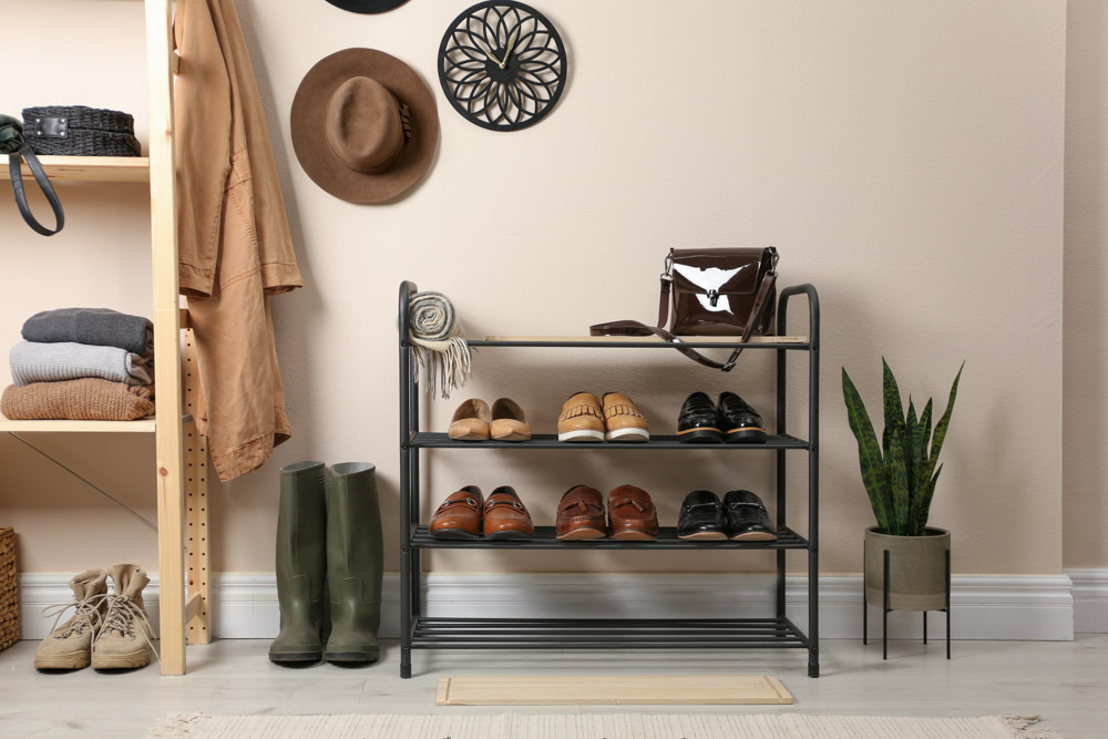 An open shoe space made with simple wired rack to avoid musty odours - Beautiful Homes
