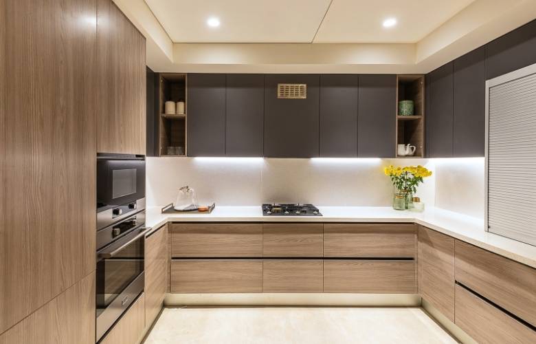 Minimalist wooden U-shaped modular kitchen design trend - Beautiful Homes