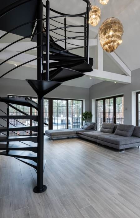Metallic spiral staircase design in the living room - Beautiful Homes Metallic spiral staircase design in the living room - Beautiful Homes