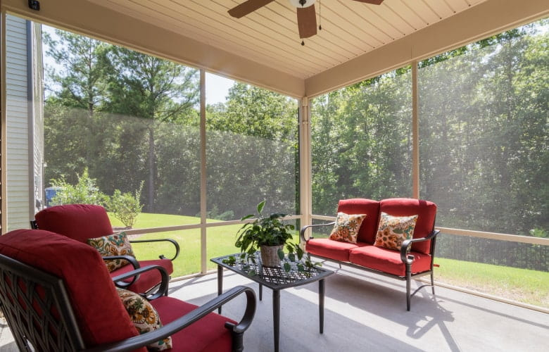 Rustic theme interiors with red sofa chairs - Beautiful Homes