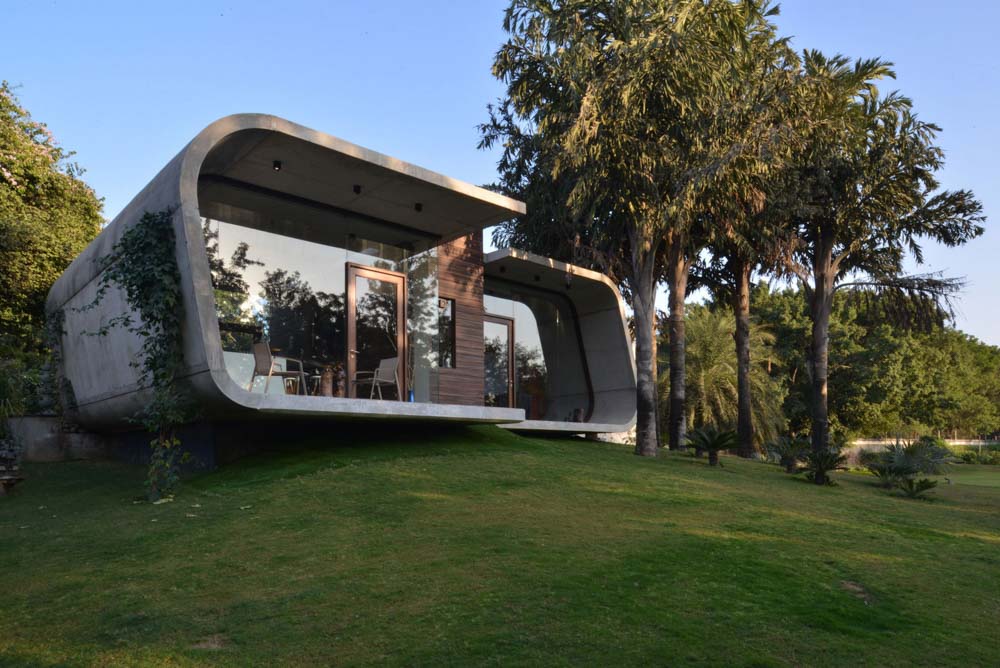 Add fancy chairs to enhance your concrete & wood exterior designs - Beautiful Homes