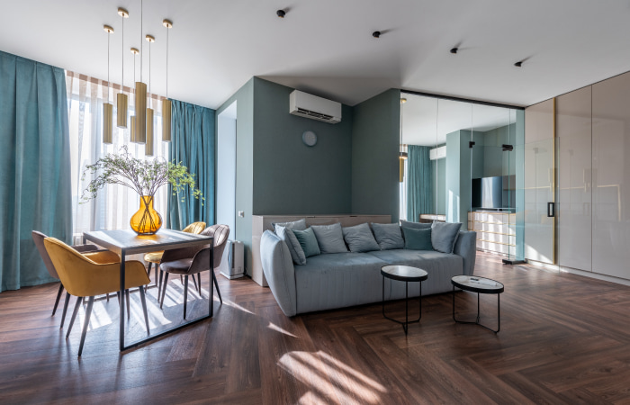 Wooden flooring & modern mirrored wardrobe for your eclectic home interiors - Beautiful Homes