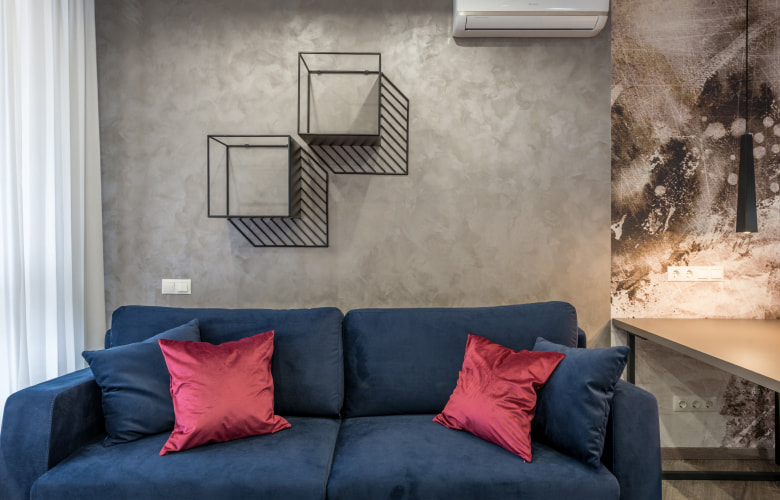 Enhance your home interiors by adding bright colored throw pillows - Beautiful Homes