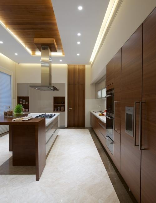 Wooden cabinet designs for your modular parallel kitchen - Beautiful Homes