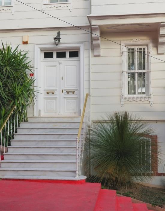 Traditional red oxide flooring on the stairs - Beautiful Homes