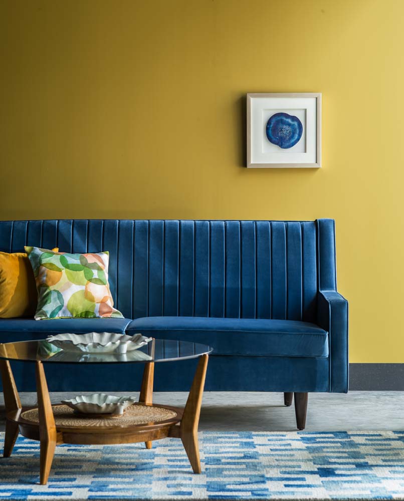 Yellow wall design for living room - Beautiful Homes