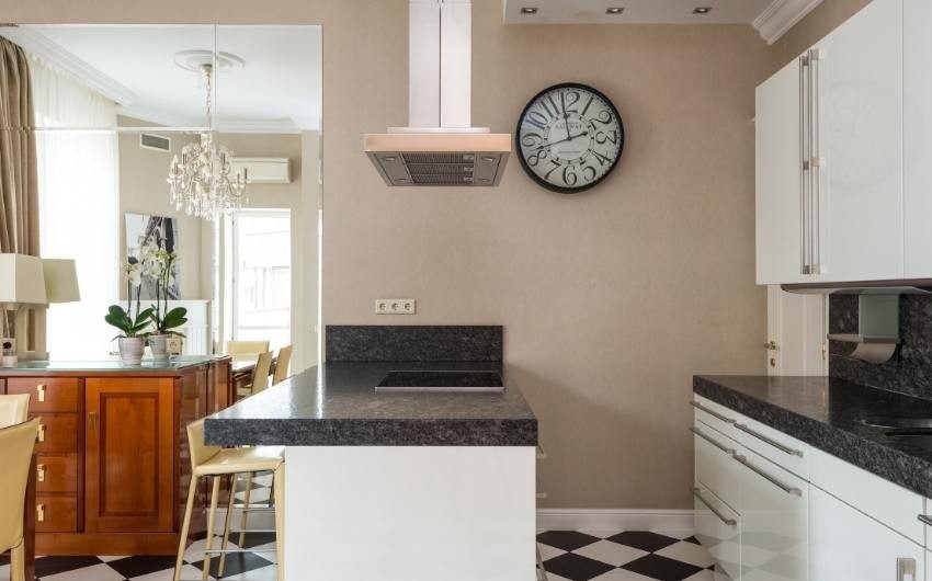 Wall clock for your open living room kitchen interior - Beautiful Homes