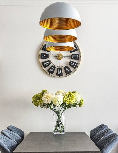 Designer wall clock for your glam living room design - Beautiful Homes